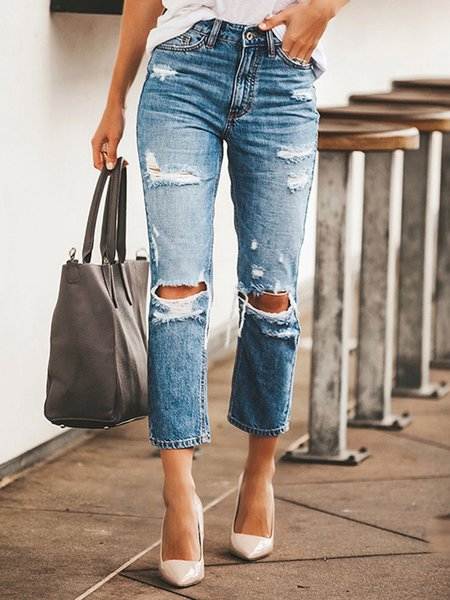 Причина популярности джинсов с дырами, плюсы и минусы моделей