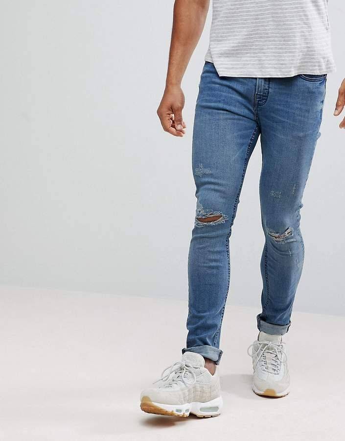 Популярные варианты узких джинсов мужских, их особенности