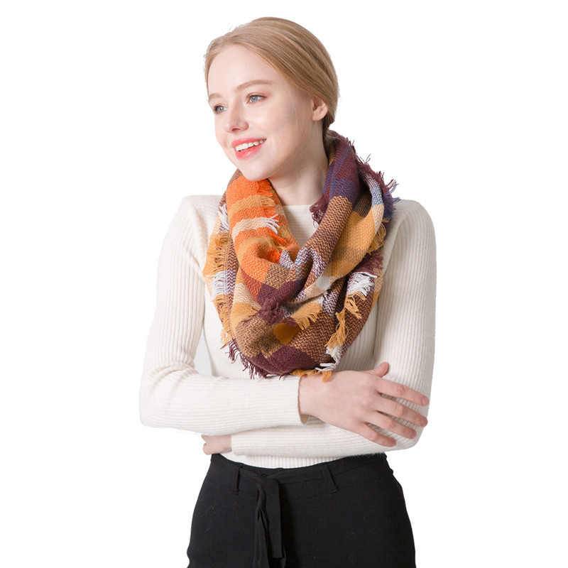 Как носить шарф этой осенью и быть в тренде